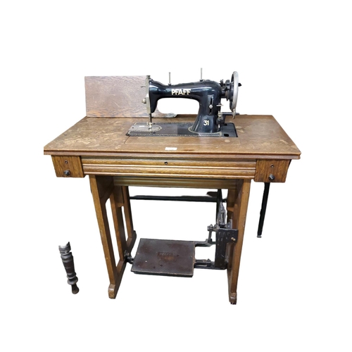 716 - Vintage treadle Pfaff sewing machine and table