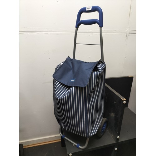 1579 - SABICHI Navy and white striped pull along shopping trolley.
Great condition.