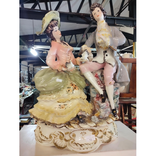 13 - Beautiful statement piece gorgeously colourful ceramic model of two 17th century figures with doves.... 