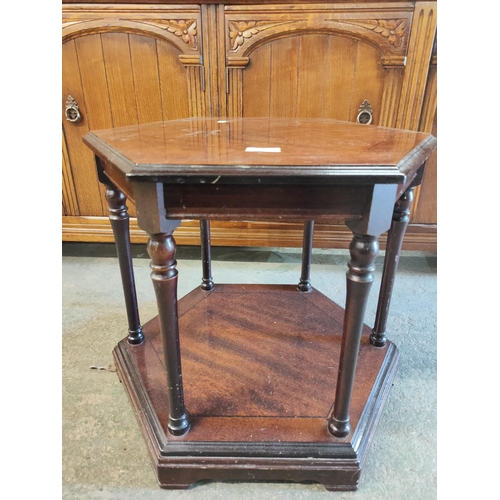 19 - Very smart dark wood hexagonal side table with turned legs and a solid base