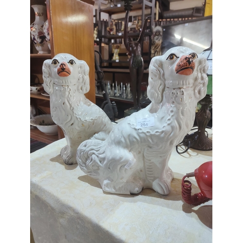 254 - 2 lovely antique Staffordshire Pottery style dogs