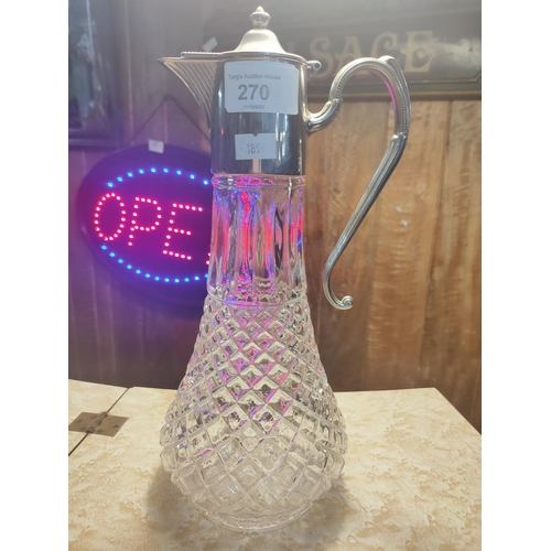 270 - Vintage glass claret jug with silver plated top