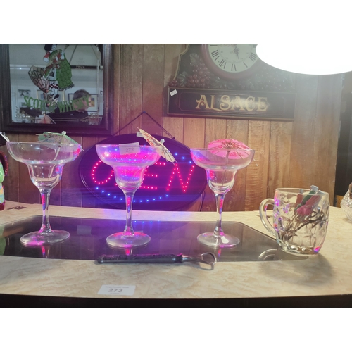 272 - Fun selection of cocktail glasses and umbrellas together with a viking inspired bottle opener