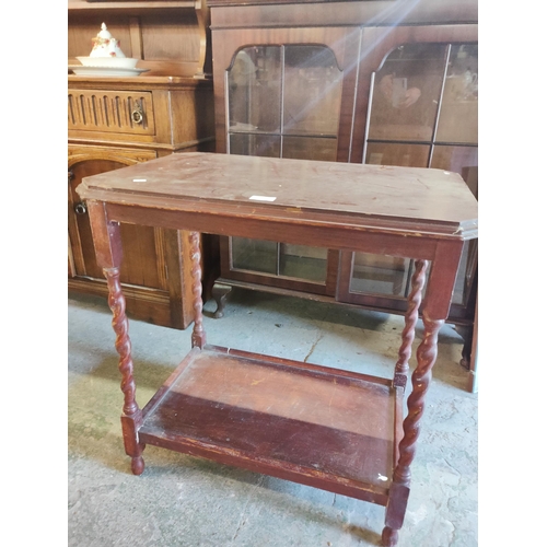 36 - Lovely side table with barley twist legs and storage shelf