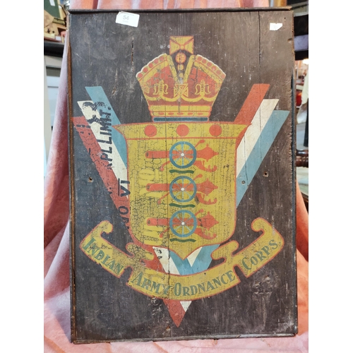 54 - INDIAN ARMY ORDNANCE Corps coat of arms  painted on board