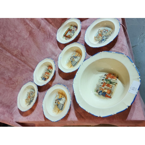 55 - Coronet Ware, Parrot and Company large bowl with 6 smaller bowls decorated with vintage internationa... 