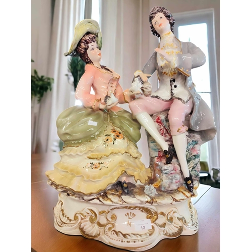 13 - Beautiful statement piece gorgeously colourful ceramic model of two 17th century figures with doves.... 