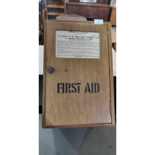 37 - Fabulous wooden Military First Aid cupboard with Military crows foot and original label outlined pre... 