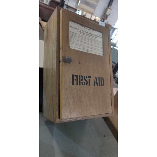 37 - Fabulous wooden Military First Aid cupboard with Military crows foot and original label outlined pre... 