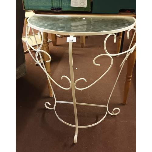 1019 - Lovely white painted wrought metal half moon hall table with glass top. A very decorative piece