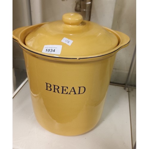 1034 - Large yellow ceramic bread bin standing approx 32cm tall