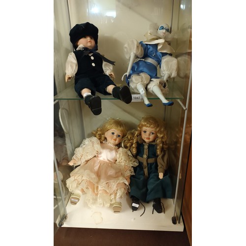 1047 - Collectable porcelain boy doll from Alberon together with a porcelain Pierrot doll, both in lovely c... 