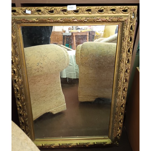 1109 - Lovely large wall mirror with an ornate gold coloured plastic surround