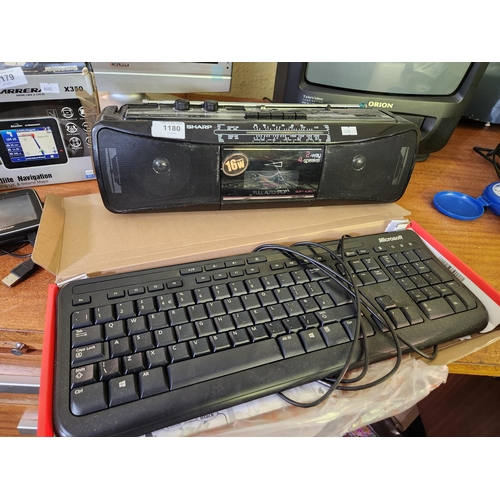 1180 - Sharp stereo radio cassette recorder model QT-250 together with an as new Microsoft keyboard