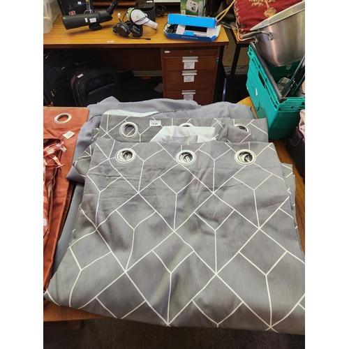 1234 - Pair of grey geometric patterned curtains measuring approx 228 x 228cm and a pair of tab topped plai... 