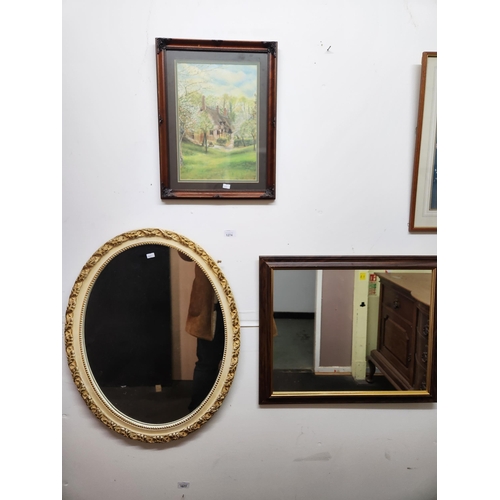 1274 - An oval beautifully framed wall mirror together with a very smart rectangular mirror with wood surro... 