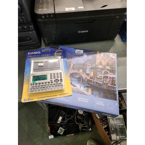 1289 - Brand new and sealed 1000 piece jigsaw of a Venetian scene together with a brand new Casio digital d... 