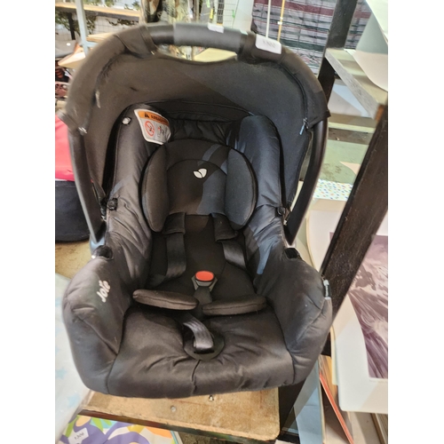 1302 - Joie black padded baby car seat