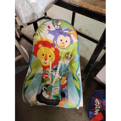 1306 - Lovely Jungle print baby's rocking chair with harness