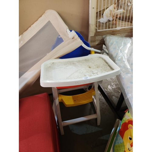 1307 - Bright plastic high chair and child's bed guard