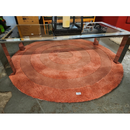 1310 - Lovely 2 tone circular rug measuring approx 140cm diameter