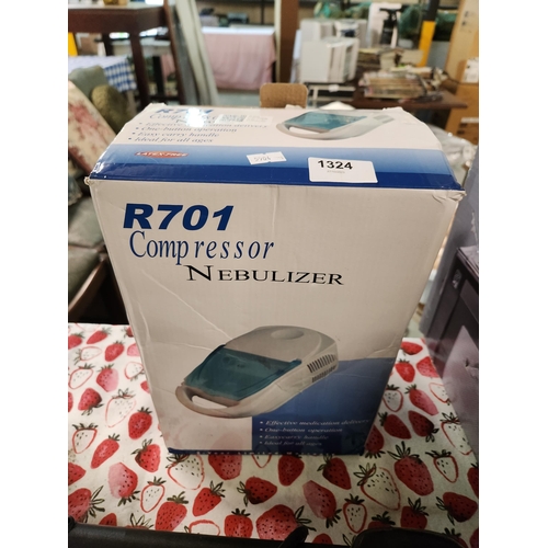 1324 - R701 Compressor nebuliser. An effective medication delivery system, one button operation and handy c... 