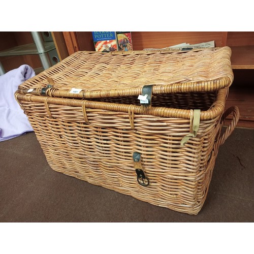 1081 - A lovely very large wicker trunk with hinged lid measuring  75cm wide (plus handles) and 47cm deep a... 