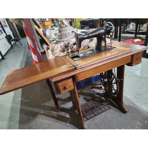 100 - Fabulous antique foldaway Singer Sewing machine table with rare wooden legs