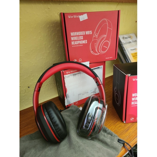 83 - BRAND NEW.
2 X WORWODER W915 WIRELESS HEADPHONES.