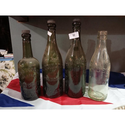 52 - 4 fabulous vintage glass beer bottles with moulded branding, 3 with original toppers