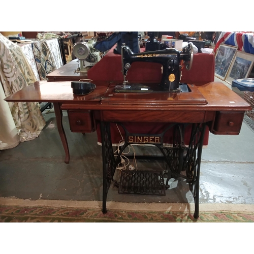 230 - Fabulous vintage Singer Sewing machine polished wooden table with metal base and foot pedal