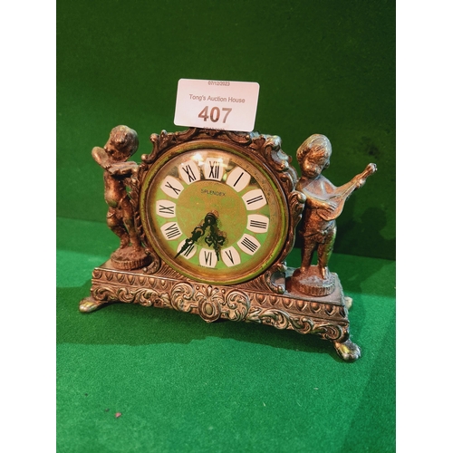 407 - Vintage metal mantle clock with cherubs