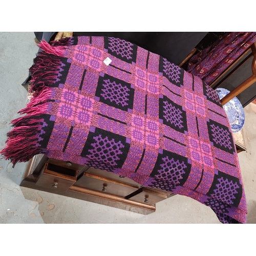 454 - Stunning Welsh blanket good condition bright vibrant colours in pink, purple and black.
Approx 220 x... 