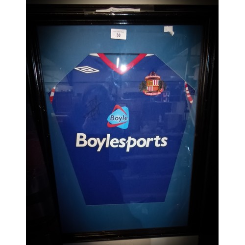 38 - Paolo Di Canio signed Sunderland football shirt, framed and glazed