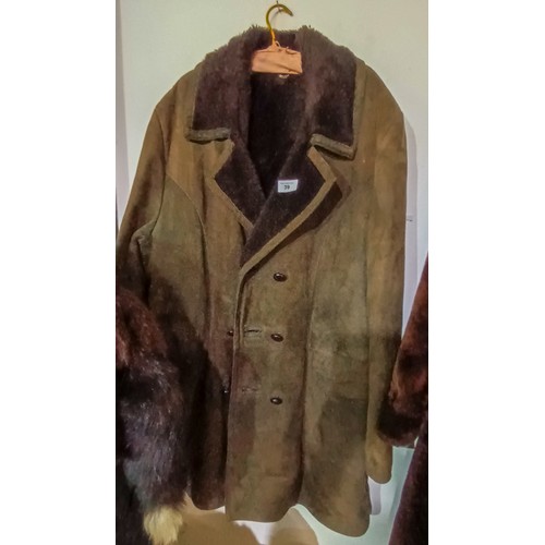 39 - Warm suede winter coat with fur lining. Unsized but chest is approx 48