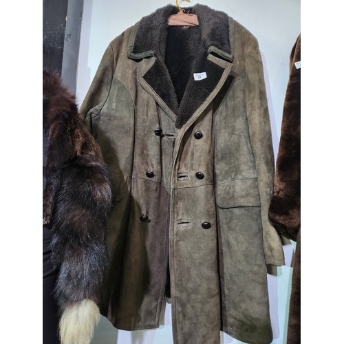 39 - Warm suede winter coat with fur lining. Unsized but chest is approx 48