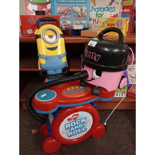 1001 - Toy Hetty the vacuum together with toy drum kit and Minion lunchbox