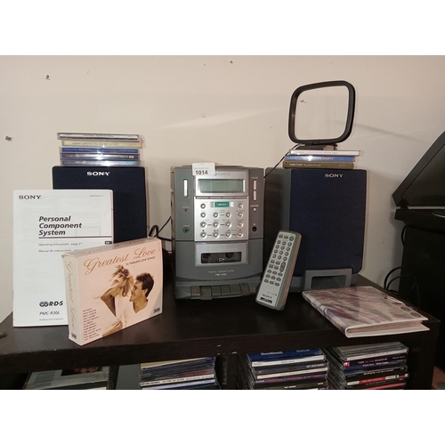 1014 - Compact Sony PMC-R30L music system with CD player and cassette player together with speakers and a l... 