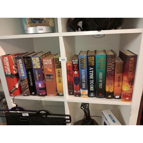 1026 - Large selection of Wilbur Smith hardback books