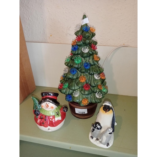 1328 - Beautiful ceramic light up Christmas tree plus penguin ornament and snowman candle holder.