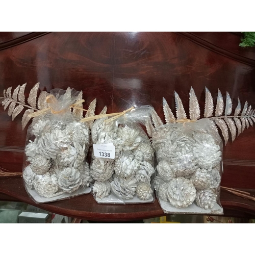 1338 - BRAND NEW, 3 BAGS of white and gold pine cones.