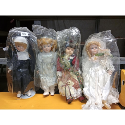 1370 - 4 collectable vintage dolls in excellent condition.