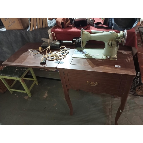 237 - Vintage Dorgan electric sewing machine housed in wooden table