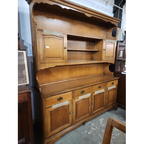 781 - Modern tall Welsh dresser excellent condition in a beautiful light wood 68'' wide 78'' tall