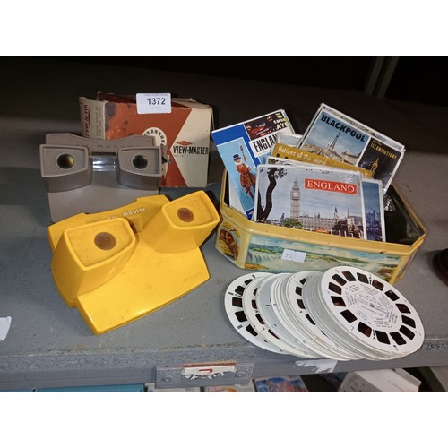 1372 - 2 vintage VIEW-MASTERS, with original box and a large collection of original slides.