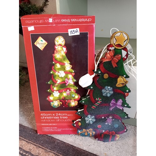 1331A - Christmas tree window silhouette, new in box.
45 x 24 cm.