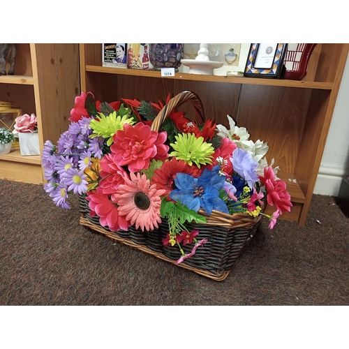 1275 - Beautiful floral display in vintage basket.