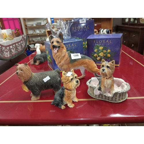 1308 - Collection of detailed dog ornaments.