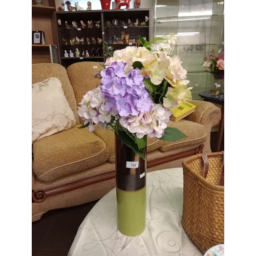 795 - LARGE ARTIFICIAL FLORAL DISPLAY IN A CERAMIC LIME AND BRONZE VASE. APPROX 70CM HEIGHT