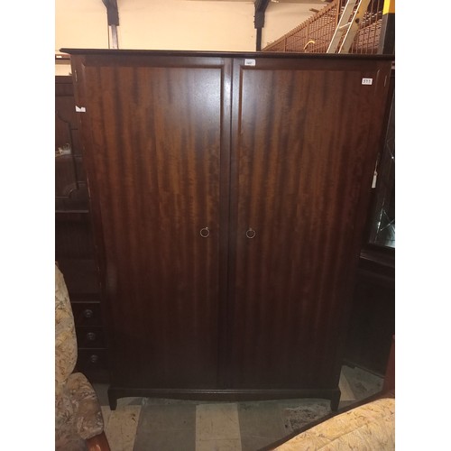 1457 - ELEGANT DARK WOODEN DOUBLE WARDROBE WITH BRASS HANDLES.
120 W X 170 H CM